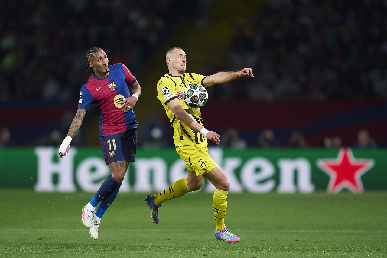 Рафинья («Барселона») и Вальдемар Антон («Боруссия» Дортмунд) (фото: Pedro Salado/Getty Images)